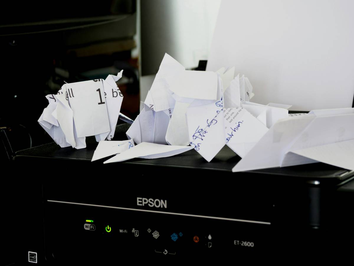 Illustration showing a stressed person looking at their loan documents